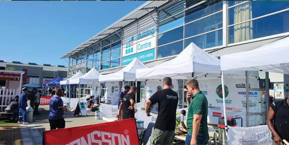 Outdoor stands and visitors at a Building Centre Expo Day